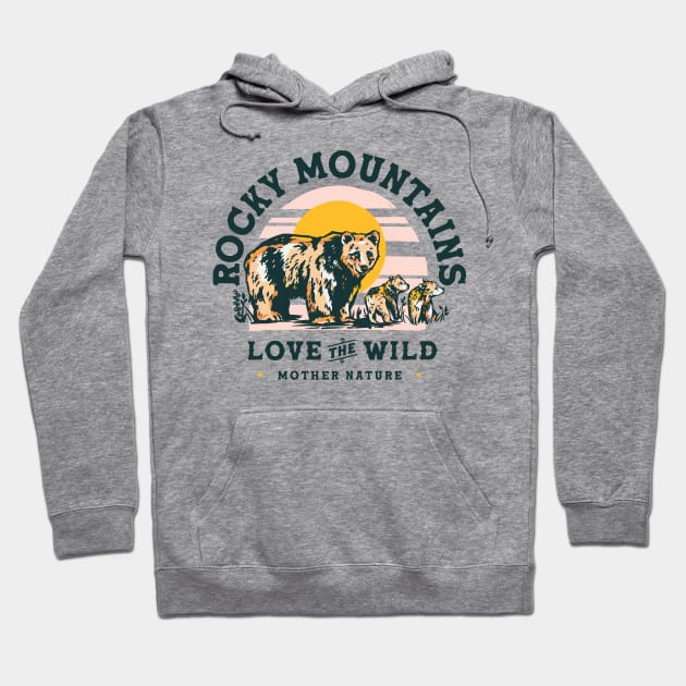 Rocky Mountains Travel Art Design Featuring A Grizzly Bear Hoodie by The Whiskey Ginger
